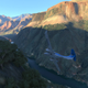 a plane flying inside the grand canyon in microsoft flight sim